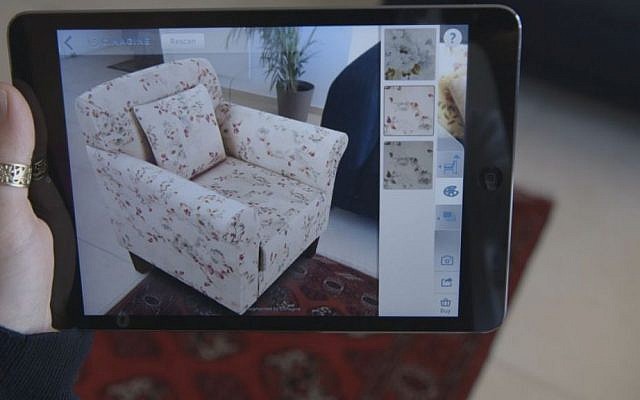 A virtual Shop Direct chair in a potential customer's living room, courtesy of augmented-reality technology (Courtesy)