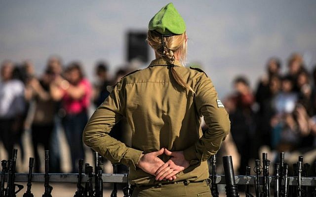 An illustrative photo of an IDF commander at a swearing-in ceremony for female recruits on February 18, 2015 (IDF Spokesperson's Unit/Flickr)
