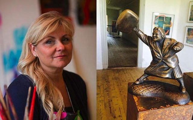 The artist Susanna Arwin with a bronze model of Danuta Danielsson hitting a neo-Nazi with her purse. The town council of Växjö has officially denied her bid to put up the sculpture, saying it glorified violence. (Photo credit: courtesy of the artist)