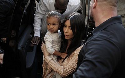 US reality TV star Kim Kardashian, her daughter North West and husband, rapper Kanye West, spent quality time in Jerusalem this week (photo credit: AFP/Ahmad Gharabli)