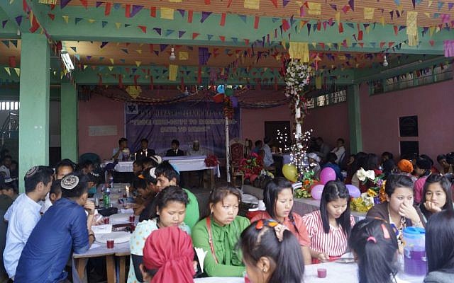 Hundreds of members of the Bnei Menashe community hold a model Passover seder in Churachandpur, in the Indian state of Manipur, Tuesday, March 31, 2015. (Jonathan Haukip/Shavei Israel)