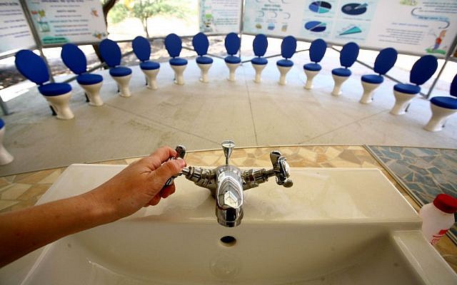 A faucet and toilets in a classroom at the ecological village in Nitzana, Israel, October 29, 2009. Students there learn about desalination and on how to save water. (photo credit: Chen Leopold/Flash 90)
