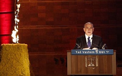 Prime Minister Benjamin Netanyahu speaks at a ceremony at the Yad Vashem Holocaust Memorial Museum in Jerusalem, as Israel marks the annual Holocaust Remembrance Day on April 15, 2015. (photo credit: Yonatan Sindel/Flash90)