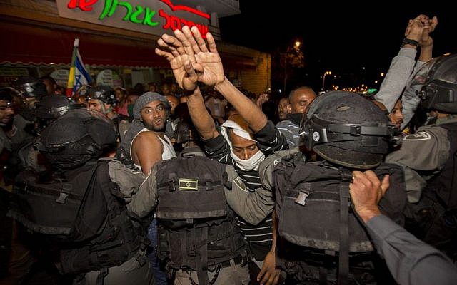 Hundreds of Israeli-Ethiopians clash with police at a protest in Jerusalem, following a video clip released a few days ago showing police beating up an IDF soldier from the Ethiopian community, April 30, 2015. (Photo credit: Yonatan SIndel/Flash90)