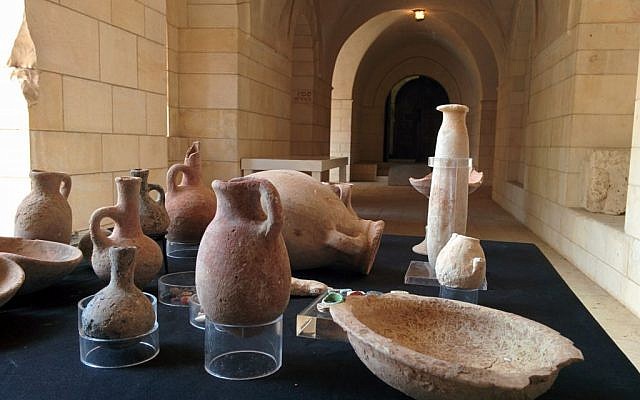 Artifacts found by IAA archaeologists in a cave near Tel Halif, in southern Israel, at the Rockefeller Museum in Jerusalem. (Ilan Ben Zion/The Times of Israel)