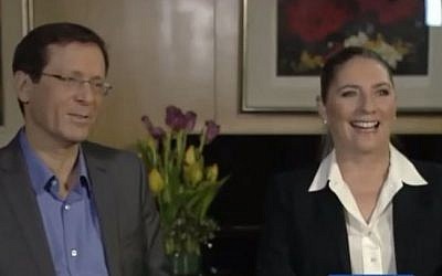 Zionist Union leader Isaac Herzog (left) and his wife, Michal, during a television interview (screen capture: YouTube/MEDIAIBA)