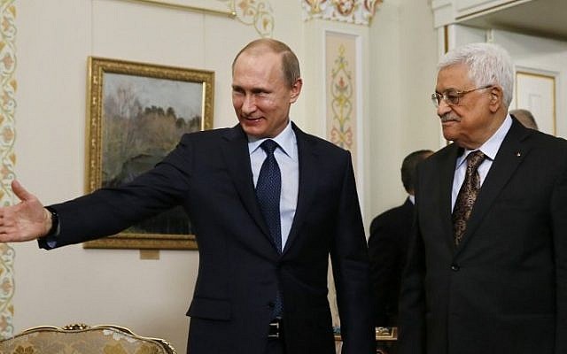 Russian President Vladimir Putin, left, shows the way to his Palestinian counterpart Mahmoud Abbas during their meeting at the Novo-Ogaryovo residence outside Moscow on April 13, 2015. (AFP/Sergei Ilnitsky, Pool)