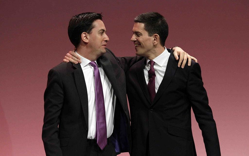 In this Monday, Sept. 27, 2010, file photo, Ed Miliband, left, the then newly-elected leader of Britain's opposition Labour Party, embraces his brother David Miliband, right, following David's speech on foreign policy during the party's annual conference, in Manchester, England. (photo credit: AP/Lefteris Pitarakis)