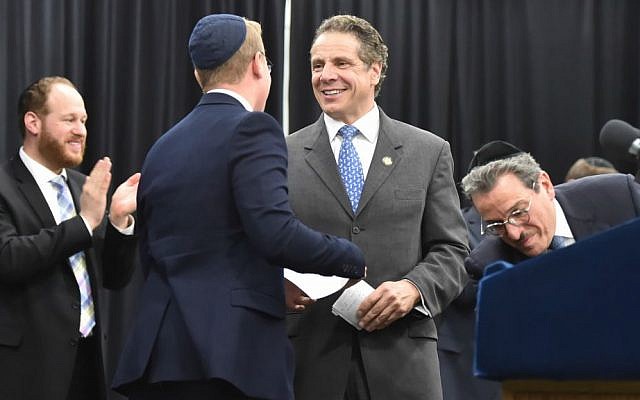 New York Gov. Andrew Cuomo speaks at a rally at Yeshiva Shaare Torah in Brooklyn in support of the Parental Choice in Education Act, May 17, 2015. (NYS Governor's Office/Kevin P. Coughlin/ via JTA)