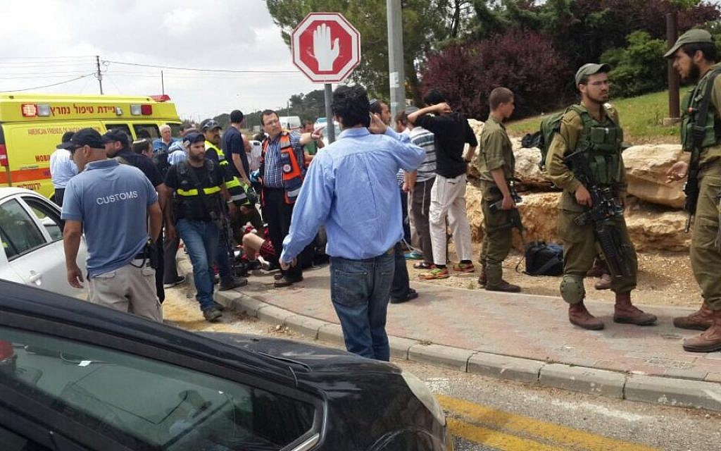 The scene of a suspected car-ramming terror attack May 14, 2015 outside the West Bank settlement of Alon Shvut. (Courtesy Zaka)