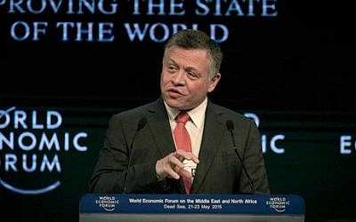 King Abdullah II of Jordan addresses the audience during the opening session of the World Economic Forum at the King Hussein convention center, Southern Shuneh, Jordan, Friday, May 22, 2015 (AP/Nasser Nasser) 
