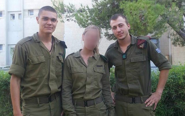 Then-First Sergeant Alex Asyanov, a paratrooper, right; Cpl. Katya, an NCO in military intelligence, who was not cleared to use her full name or show her face; and Sgt. Igor Havkin, a company sergeant in the Ordnance Corps' Basic Training (Netta  Asner/ IDF Spokesperson's Unit)