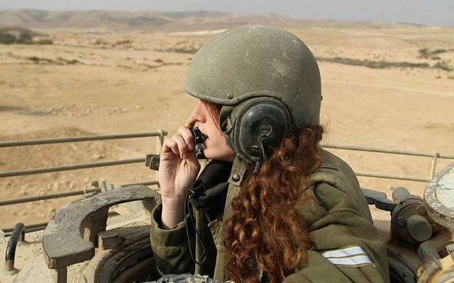Illustrative image of a female IDF tank instructor during an exercise on January 1, 2013. (Cpl. Zev Marmorstein/IDF Spokesperson's Unit)