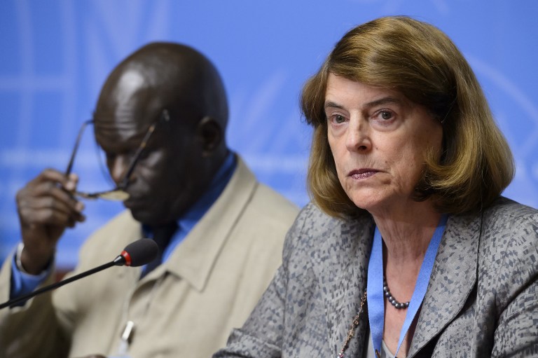Chairperson of the Independent Commission of Inquiry into the 2014 war in Gaza, Mary McGowan Davis (right) and commission member Doudou Dienne (left) during a press conference on their report at the United Nations Office in Geneva, Switzerland, on June 22, 2015. (AFP/Fabrice Coffrini)