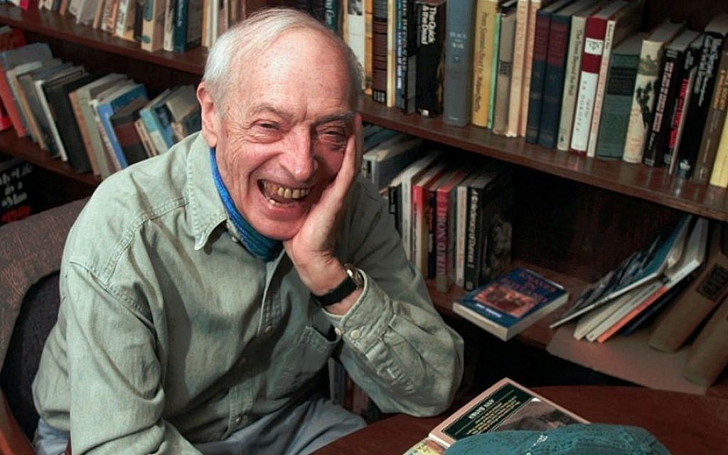 Saul Bellow laughs during a 1997 interview in his office at Boston University, where he taught literature. (AP Photo/Elise Amendola)