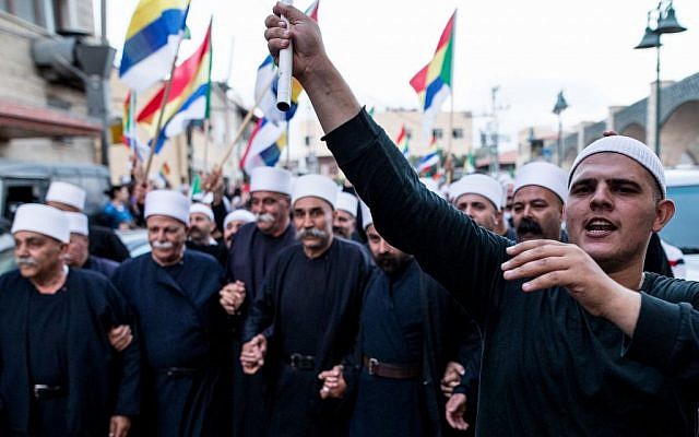 Israeli Druze in the village of Yarka attend a demonstration in support of Syrian Druze communities threatened by that country's civil war, June 14, 2015. (Basel Awidat/Flash90)