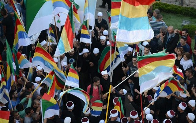 Israeli Druze from the village of Majdal Shams attend a demonstration in support of their Syrian Druze brothers in northern Israel on June 15, 2015 (Jule Gamal/Flash90)