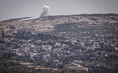 View of bombing between Syrian forces from the Israeli side of the border with Syria in the Golan Heights due, on June 16, 2015. (Basel Awidat/Flash90)