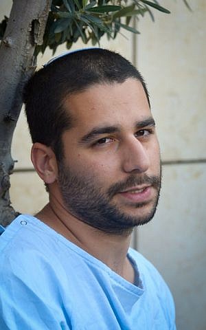 Netanel Hadad, who was wounded in the June 19, 2015, terrorist attack near Dolev in the West Bank in which his friend Danny Gonen was killed. (Photo by FLASH90)