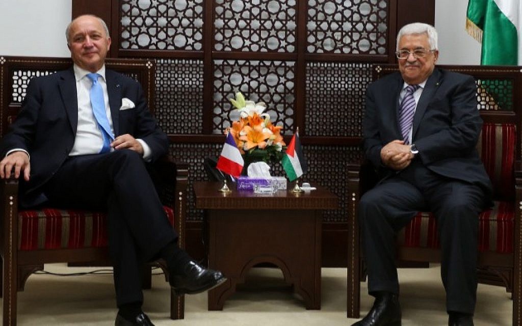 French Foreign Minister Laurent Fabius meets with Palestinian Authority President Mahmoud Abbas in the West Bank city of Ramallah on June 21, 2015. (Flash90)