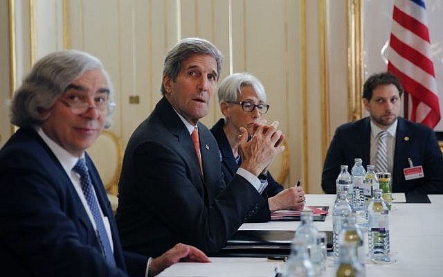 From left, US Secretary of Energy Ernest Moniz, US Secretary of State John Kerry and US Under Secretary for Political Affairs Wendy Sherman, sit during a meeting with Iranian Foreign Minister Mohammad Javad Zarif at a hotel in Vienna, Austria, Sunday, June 28, 2015. (Carlos Barria/Pool Photo via AP)