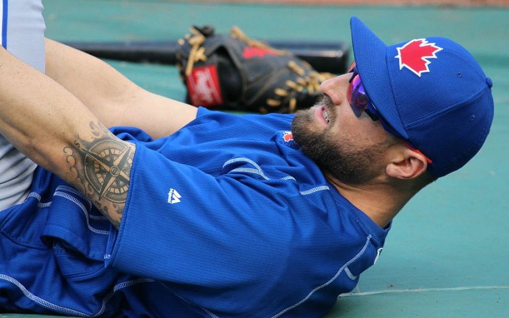 Toronto Blue Jays' outfielder Kevin Pillar displaying the nautical compass tattoo tribute to his grandfather. (Hillel Kuttler/JTA)