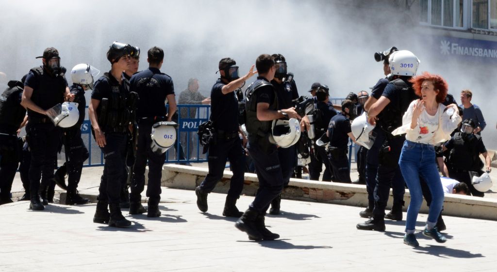 Turkish riot police use teargas against nationalist protesters against a rally by the pro-Kurdish Peoples' Democracy Party (HDP) in Erzurum, June 4, 2015. (AP)