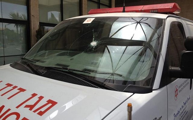 Bullet holes in a Magen David Adom ambulance, attacked in the West Bank on June 27, 2015 (Courtesy MDA)
