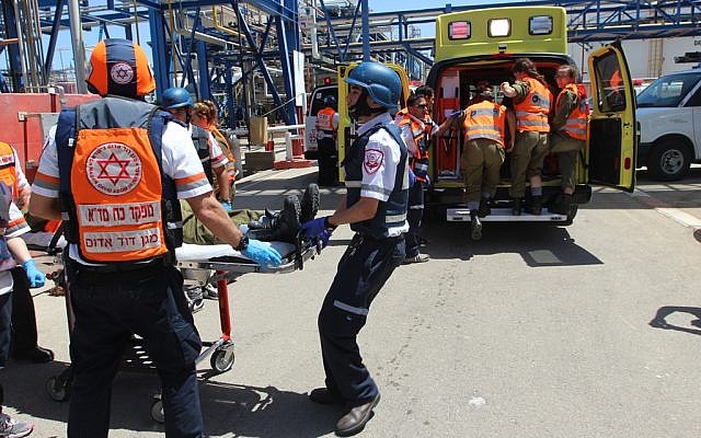 Illustrative of Magen David Adom paramedics during Turning Point 15, a large-scale Home Front drill held in Israel in June 2015. (Magen David Adom)