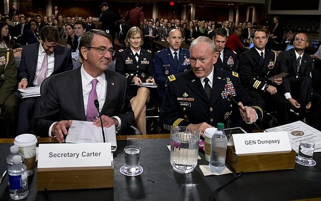 Chairman of the Joint Chiefs of Staff, Gen. Martin Dempsey, right, and Defense Secretary Ash Carter take their seats as they arrive at the Senate Armed Services Committee hearing, Washington, July 7, 2015. (AP/Carolyn Kaster)