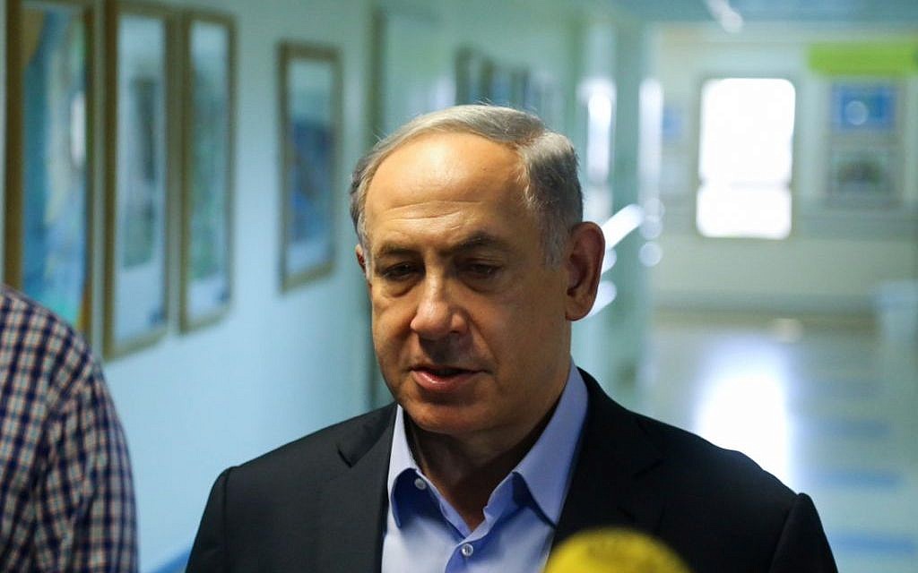 Prime Minister Benjamin Netanyahu gives a press statement after visiting the Dawabsha family at the hospital following an arson attack by alleged Jewish extremists in the Palestinian village of Duma, near Nablus, where the Dawabsha's infant son Ali was killed, and the rest of the family injured, on July 31, 2015. (Photo by FLASH90)
