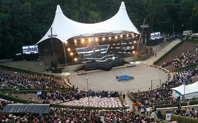 The opening ceremony of the European Maccabi Games in Berlin, a first since World War II, at the Waldbüche amphitheater, constructed for the 1936 Olympic Games and originally named for Adolf Hitler's mentor Dietrich Eckart, July 29, 2015. (Ilan Ben Zion)