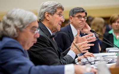 Secretary of State John Kerry, center, flanked by Treasury Secretary Jacob Lew, right, and Energy Secretary Ernest Moniz, testifies on Capitol Hill in Washington, Tuesday, July 28, 2015, before the House Foreign Affairs Committee hearing on the Iran Nuclear Agreement. (AP Photo/Andrew Harnik)