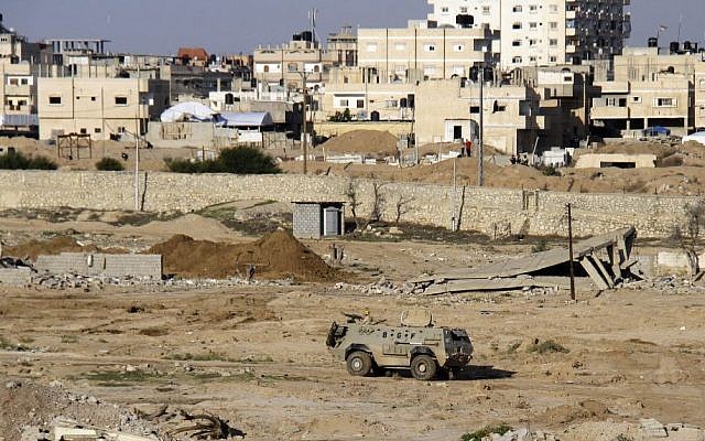 In this Nov. 6, 2014, file photo, an Egyptian army armored vehicle stands on the on the Egyptian side of border town of Rafah, north Sinai, Egypt. (Ahmed Abd El Latif, El Shorouk Newspaper/AP)