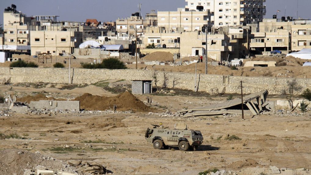 FILE - In this Nov. 6, 2014 file photo, an Egyptian army armored vehicle stands on the on the Egyptian side of border town of Rafah, north Sinai, Egypt. (Ahmed Abd El Latif, El Shorouk Newspaper/AP) 