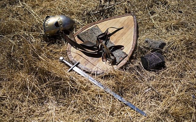 Knight gear laid on the ground after the reenactment of the Battle of Hattin at the Horns of Hattin, northern Israel, July 4, 2015 photo. (AP/Oded Balilty) 