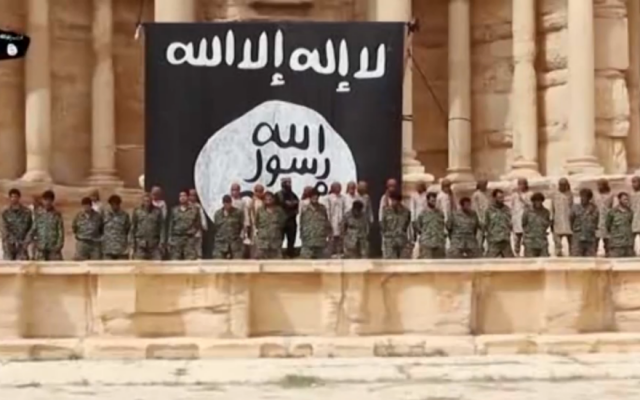 Image from an Islamic State video showing the mass execution of Syrian soldiers on the stage of the amphitheater in the ancient city of Palmyra, Syria shortly after the group captured the city on May 21, 2015. (screen grab: YouTube)