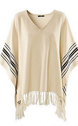 Back in 2011, H&M featured a woman’s poncho that also resembled the classic black-and-white fringed tallit. (screenshot)
