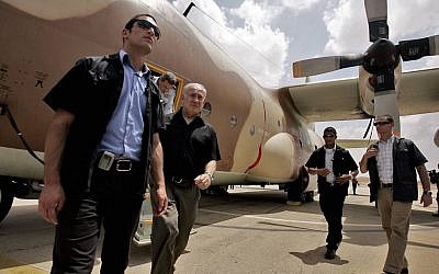 Prime Minister Benjamin Netanyahu walks out of a C-130 Hercules aircraft, used in the raid to release Israeli hostages held at Entebbe airport in Uganda in 1976, during a visit to Hatzerim Air base near Beersheba in 2009. (Photo by Edi Israel/Flash90)