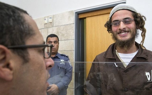 Meir Ettinger, the alleged head of a Jewish extremist group, at the Magistrate's Court in Nazareth Illit on August 4, 2015, a day after his arrest. (AFP/Jack Guez)