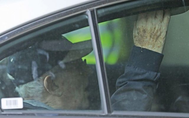 Lord Greville Janner is driven into Westminster Magistrates Court in London, Friday, Aug. 14, 2015. He was accused of 22 alleged child sex offenses committed in the 1960s, 1970s and 1980s. (AP Photo/Frank Augstein)