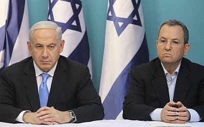 Prime Minister Benjamin Netanyahu and then defense minister Ehud Barak attend a press conference at the PM's office in Jerusalem, November 21, 2012. (Miriam Alster/FLASH90)