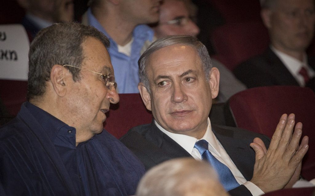 Prime Minister Benjamin Netanyahu (right) and former prime minister Ehud Barak (left) attend a screening of the documentary on 'Operation Isotope,' the 1972 operation on the hijacked Sabena plane, at Cinema City in Jerusalem, August 11, 2015. (Hadas Parush/Flash90)