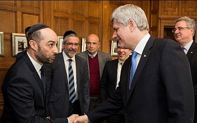 Steve Maman shakes hands with Canadian Prime Minister Stephen Harper. (Courtesy Steve Maman)