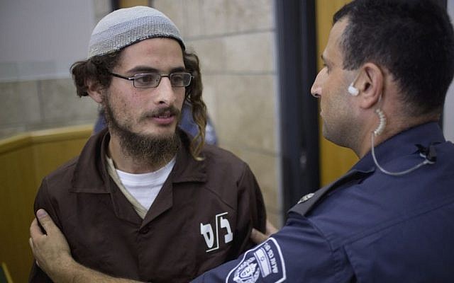 Alleged head of a Jewish extremist group Meir Ettinger appears in the Magistrate's Court in Nazareth Illit, August 4, 2015. (AP/Ariel Schalit)