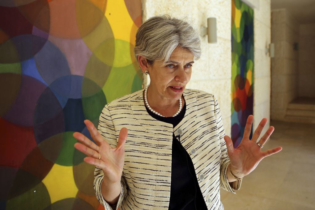 The chief of the UN's education and culture agency, Irina Bokova of Bulgaria, gestures during an interview with The Associated Press at the Global Forum for Youth, Peace and Security, in Madaba, Jordan, Friday, Aug. 21, 2015. (AP/Raad Adayleh) 