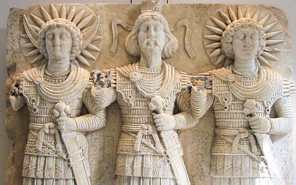 Palmyrene deities Aglibol, Baal Shamin (center), and Malakbel, 1st century, found near Palmyra, Syria. (CC, BY-SA, Louvre Museum. Personal photograph 2006/Wikimedia)