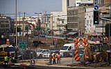 Illustrative: Light rail construction taking place at the intersection of Allenby and Yehuda Halevi streets in Tel Aviv, August 4, 2015. (Miriam Alster/Flash90)