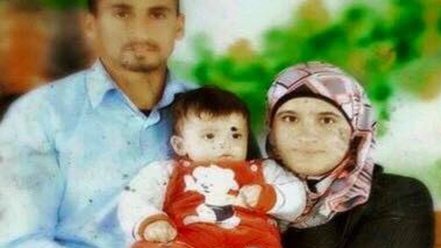 Saad and Riham Dawabsha, with baby Ali. All three died when the Dawabsha home in the West Bank village of Duma was firebombed, by suspected Jewish extremists, on July 31, 2015 (Channel 2 screenshot)