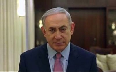 Prime Minister Benjamin Netanyahu in a still image from a video clip he recorded, where he speaks of the stabbing at the pride parade in Jerusalem. The clip was aired at a rally in Tel Aviv on Saturday, August 1 2015. (Screen capture Facebook)